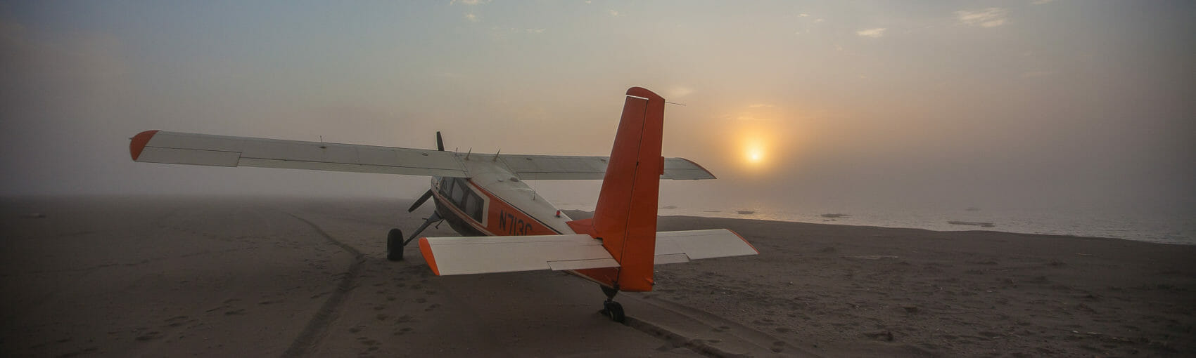 An airplane in the coastal fog of the arctic coast