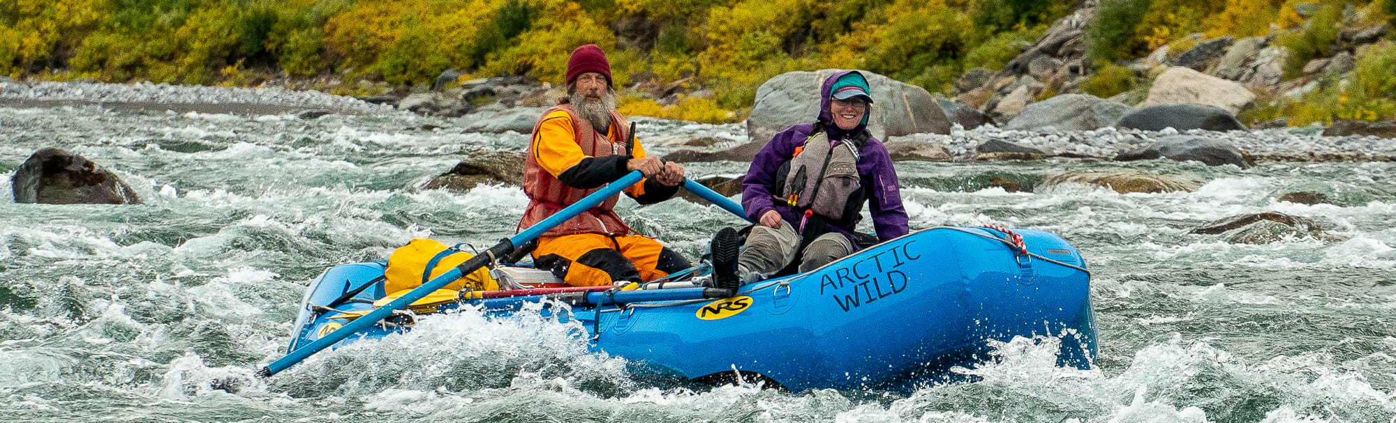 Raft negotiates some rapids in the Arctic National Wildlife Refuge Alaska