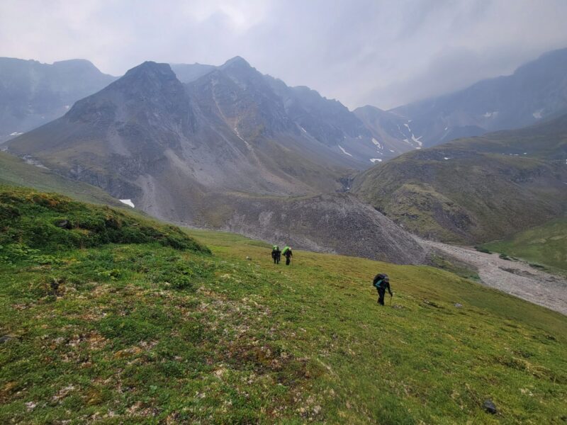 Backpackers in the alpine tundra in Gates of the Arctic National Park with Arctic Wild